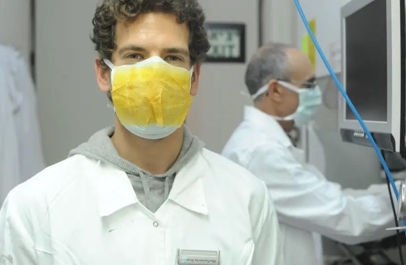 Israeli-developed sticker that enhances mask protection is mass produced